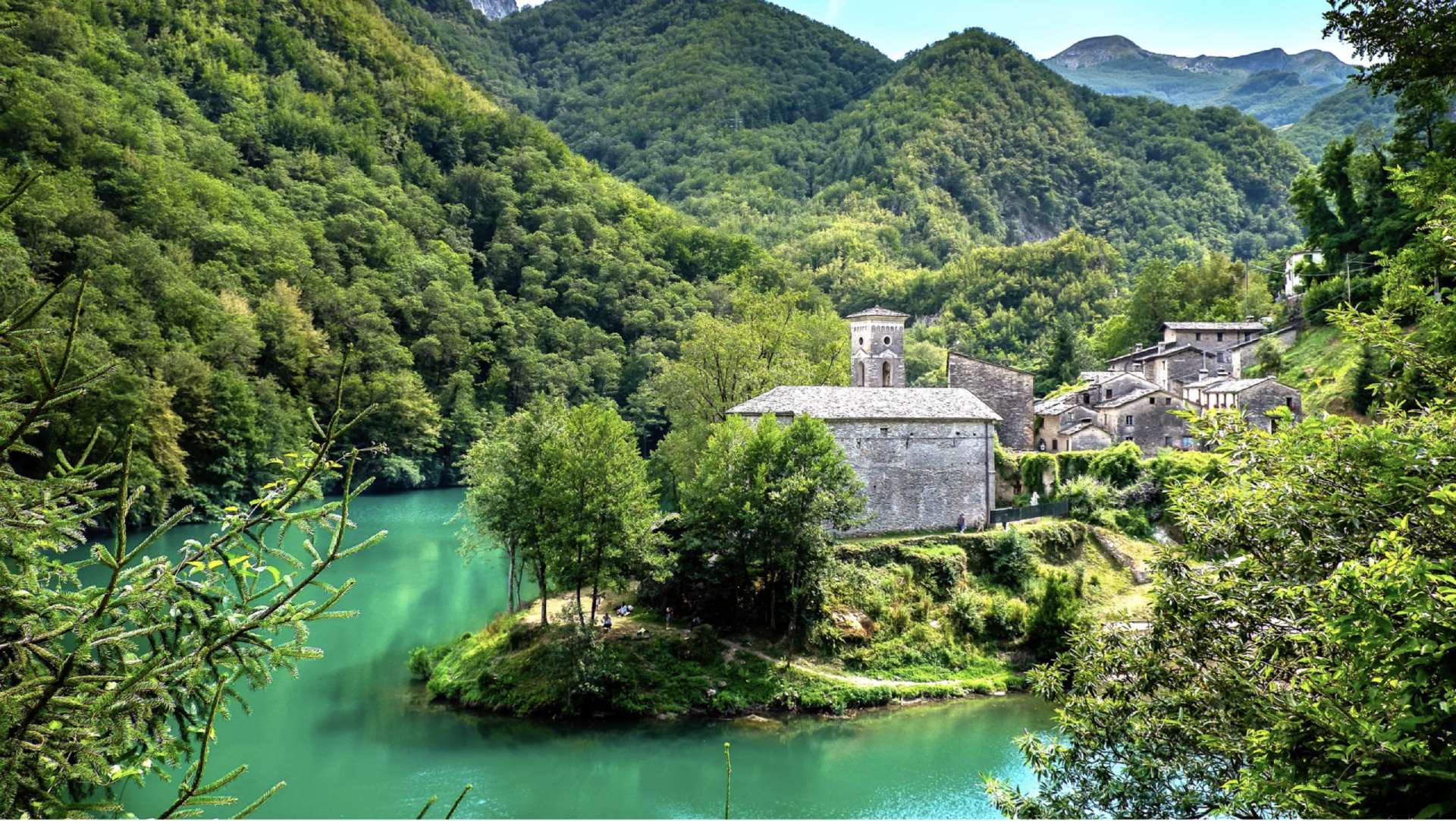 Explore village of Isola Santa nestled on the shores of its namesake lake in the Apuan Alps of Tuscany on Vespa rental
