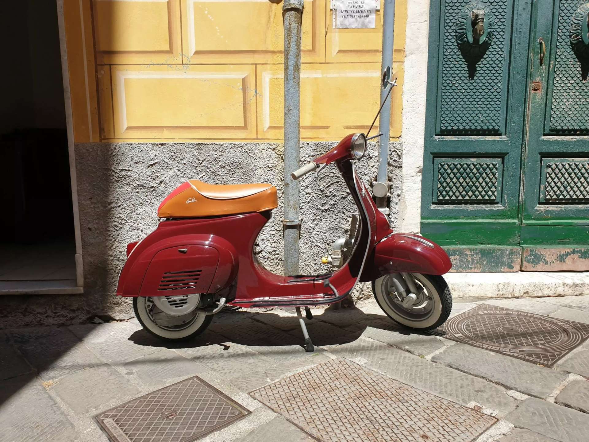 vintage Piaggio Vespa is a classic scooter model known for its iconic Italian design and enduring popularity and ready to rent by vesparun